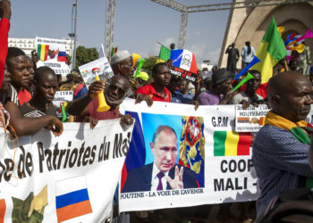 Malians demonstrate against France and in support of Russia on the 60th anniversary of the independence of the Republic of Mali in 1960, in Bamako, Mali Tuesday, Sept. 22, 2020. Junta leader and now vice-president of the transitional government Col. Assimi Goita on Tuesday promised to "build a new Mali, a new Malian". Banner in French reads "Putin, the road to the future". (AP Photo)