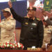 Sudan's Army chief Abdel Fattah al-Burhan (C R) and paramilitary commander Mohamed Hamdan Dagalo (C L) lift documents alongside civilian leaders following the signing of an initial deal aimed at ending a deep crisis caused by last year's military coup, in the capital Khartoum on December 5, 2022. - The past year has seen near-weekly protests and a crackdown that pro-democracy medics say has killed at least 121, a spiralling economic crisis exacerbated by donors slashing funding, and a resurgence of ethnic violence in several remote regions. Divisions among civilian groups have deepened since the coup, with some urging a deal with the military while others insist on "no partnership, no negotiation". (Photo by ASHRAF SHAZLY / AFP)