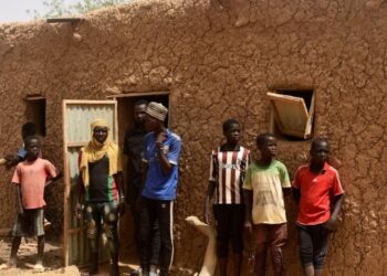 Residents of Zibane-Koira Zéno, a village in the Tillabéri region (western Niger close to Mali) attends a meeting on May 12, 2020, after an attack by armed men on May 8, 2020. (Photo by BOUREIMA HAMA / AFP)