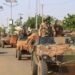 A convoy of French troops based in Niger drives by as they prepare to leave Niger, in Niamey, October 10, 2023. REUTERS/Mahamadou Hamidou NO RESALES. NO ARCHIVES