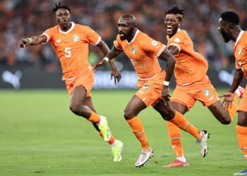 Ivory Coast's midfielder #6 Seko Fofana (C) celebrates scoring his team's first goal during the Africa Cup of Nations (CAN) 2024 group A football match between Ivory Coast and Guinea-Bissau at the Alassane Ouattara Olympic Stadium in Ebimpe, Abidjan, on January 13, 2024. (Photo by FRANCK FIFE / AFP)